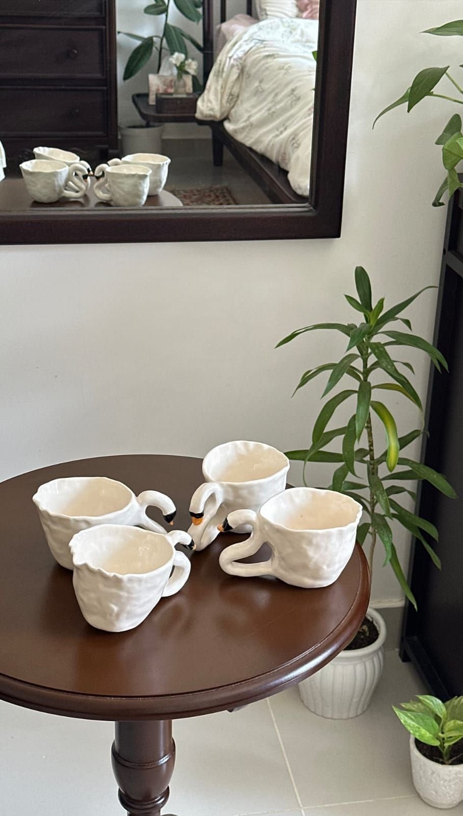 مجموعة بجع متعرج الريش